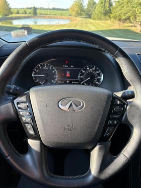 White 2024 INFINITI QX80 LUXE AWD