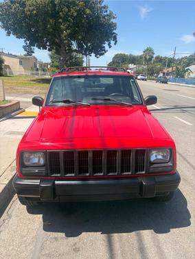 Red 1997 Jeep Cherokee Sport