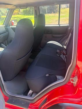 Red 1997 Jeep Cherokee Sport