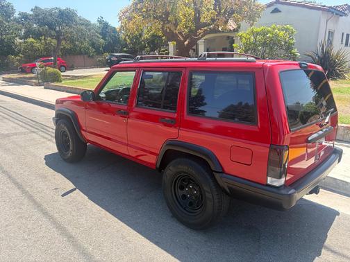 Red 1997 Jeep Cherokee Sport
