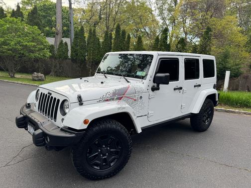 White 2016 Jeep Wrangler Unlimited Sahara