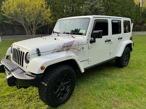 White 2016 Jeep Wrangler Unlimited Sahara