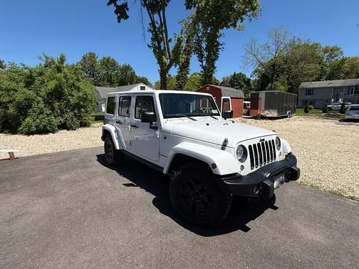 White 2016 Jeep Wrangler Unlimited Sahara