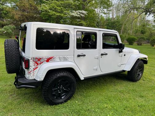White 2016 Jeep Wrangler Unlimited Sahara