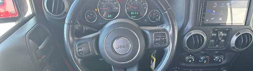 Red 2015 Jeep Wrangler Unlimited Sport