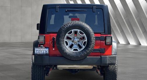 Red 2015 Jeep Wrangler Unlimited Sport