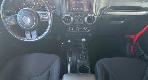 Red 2015 Jeep Wrangler Unlimited Sport