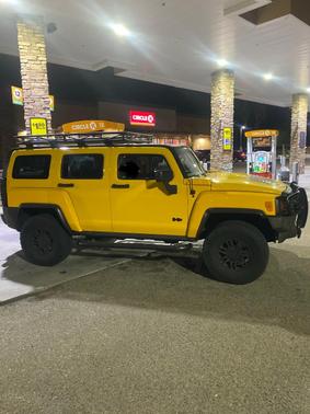 Yellow 2007 Hummer H3 Base