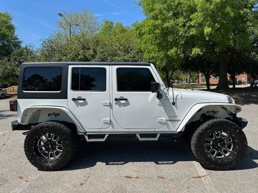 White 2013 Jeep Wrangler Unlimited Sahara