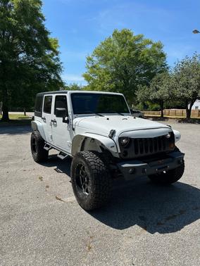 White 2013 Jeep Wrangler Unlimited Sahara