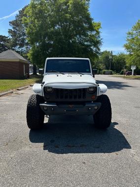 White 2013 Jeep Wrangler Unlimited Sahara