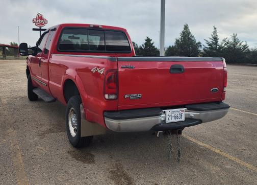Red 2000 Ford F-250 Lariat SuperCab Super Duty