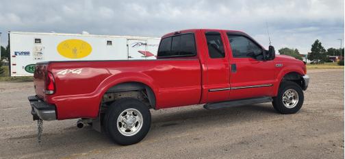 Red 2000 Ford F-250 Lariat SuperCab Super Duty