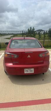 Red 2014 Mitsubishi Lancer ES
