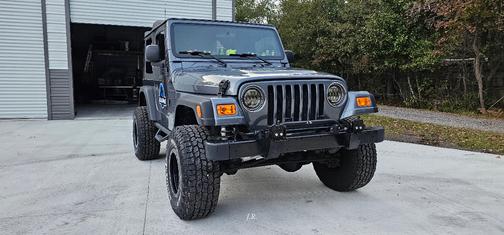 Blue 1999 Jeep Wrangler SE