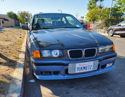 Blue 1999 BMW 323 iS