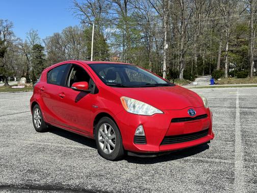 Red 2013 Toyota Prius c Three