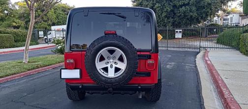 Red 2006 Jeep Wrangler Unlimited Rubicon
