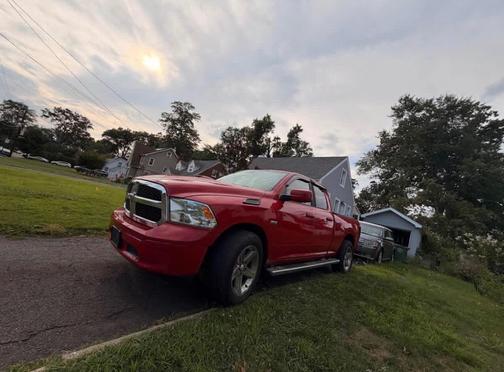 Red 2015 RAM 1500 SLT