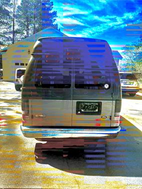 Gray 2005 Ford E150 Base