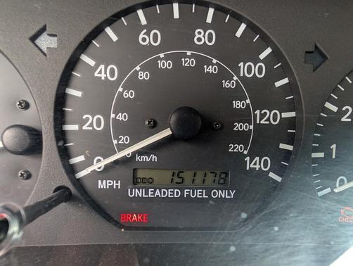 Gold 1999 Toyota Camry LE