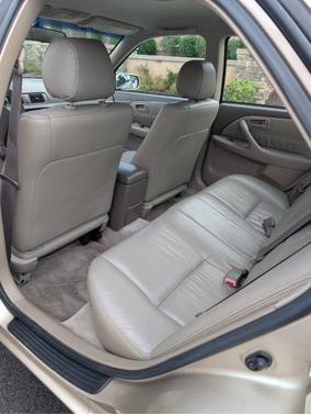 Gold 1999 Toyota Camry LE