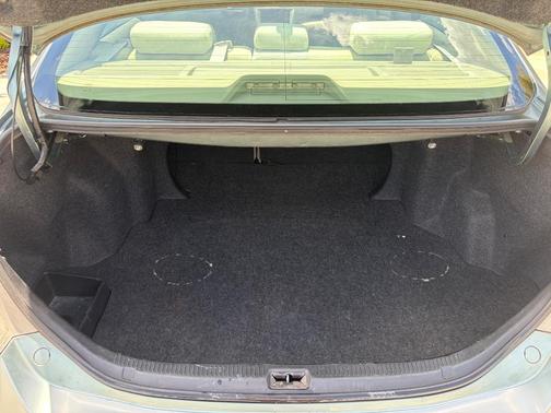 Green 2010 Toyota Camry LE