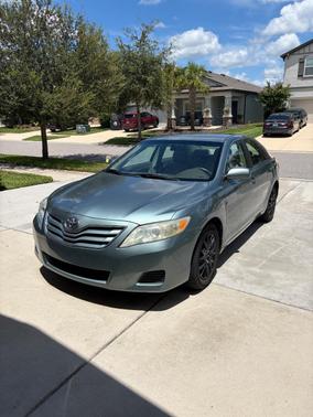 Green 2010 Toyota Camry LE