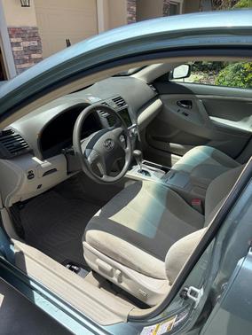 Green 2010 Toyota Camry LE