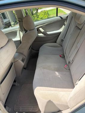 Green 2010 Toyota Camry LE