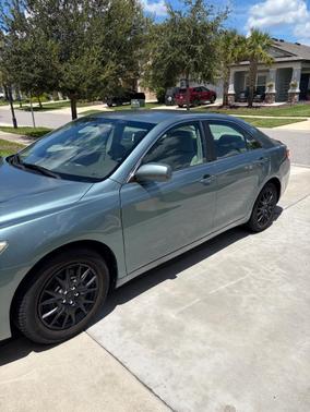 Green 2010 Toyota Camry LE