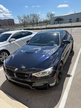 Blue 2017 BMW M4 Base