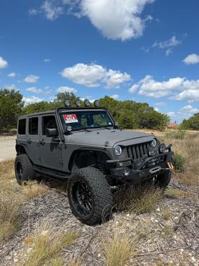 Black 2015 Jeep Wrangler Unlimited Sport