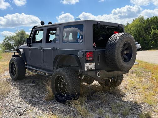 Black 2015 Jeep Wrangler Unlimited Sport