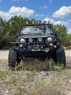 Black 2015 Jeep Wrangler Unlimited Sport