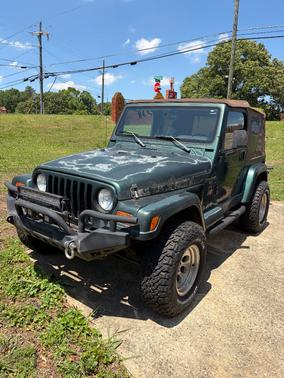 Green 1999 Jeep Wrangler Sahara