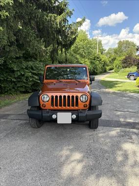 Orange 2011 Jeep Wrangler Unlimited Sport