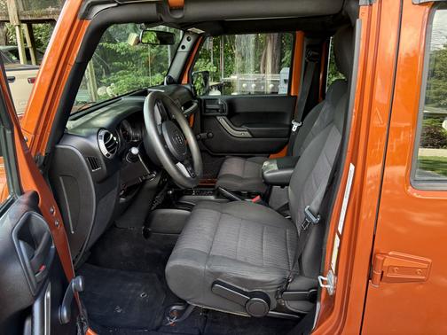 Orange 2011 Jeep Wrangler Unlimited Sport