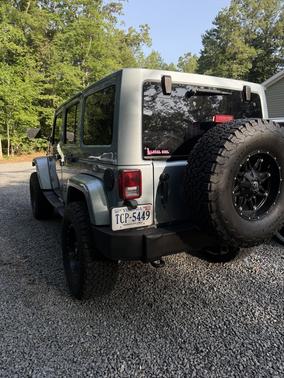 Blue 2012 Jeep Wrangler Unlimited Sport RHD