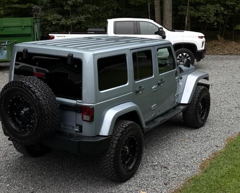 Blue 2012 Jeep Wrangler Unlimited Sport RHD