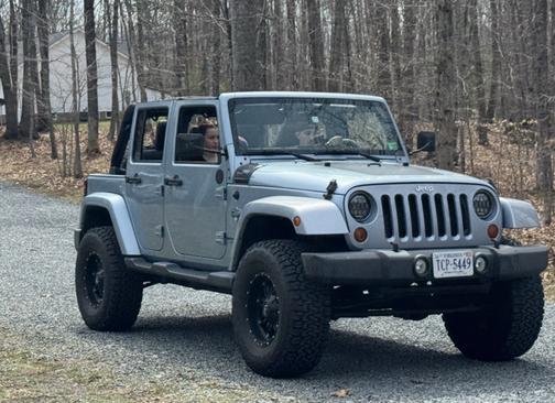 Blue 2012 Jeep Wrangler Unlimited Sport RHD