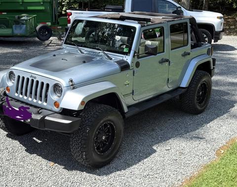 Blue 2012 Jeep Wrangler Unlimited Sport RHD