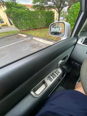 Silver 2011 Nissan Versa 1.8 S