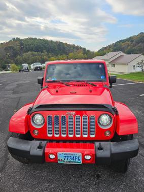 Red 2017 Jeep Wrangler Unlimited Sahara