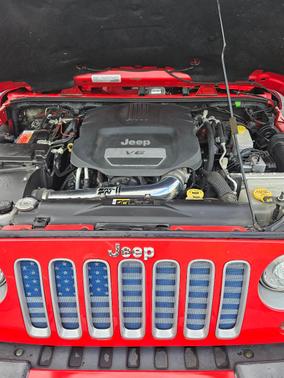 Red 2017 Jeep Wrangler Unlimited Sahara