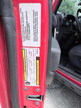 Red 2013 Jeep Wrangler Sport