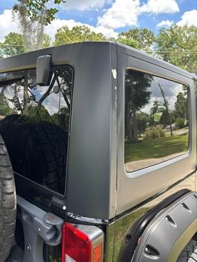 Black 2014 Jeep Wrangler Unlimited Sport