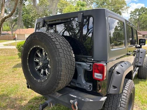 Black 2014 Jeep Wrangler Unlimited Sport