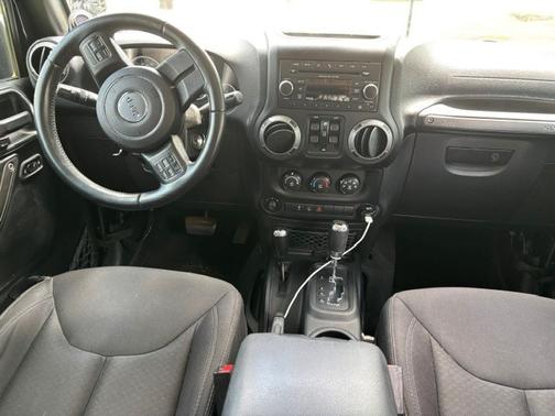 Black 2014 Jeep Wrangler Unlimited Sport