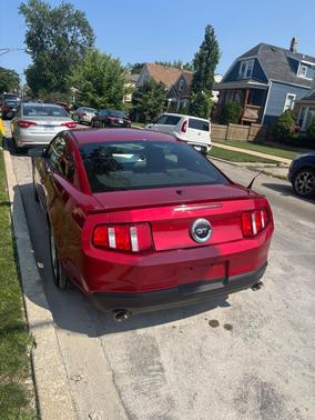 Red 2010 Ford Mustang GT Premium